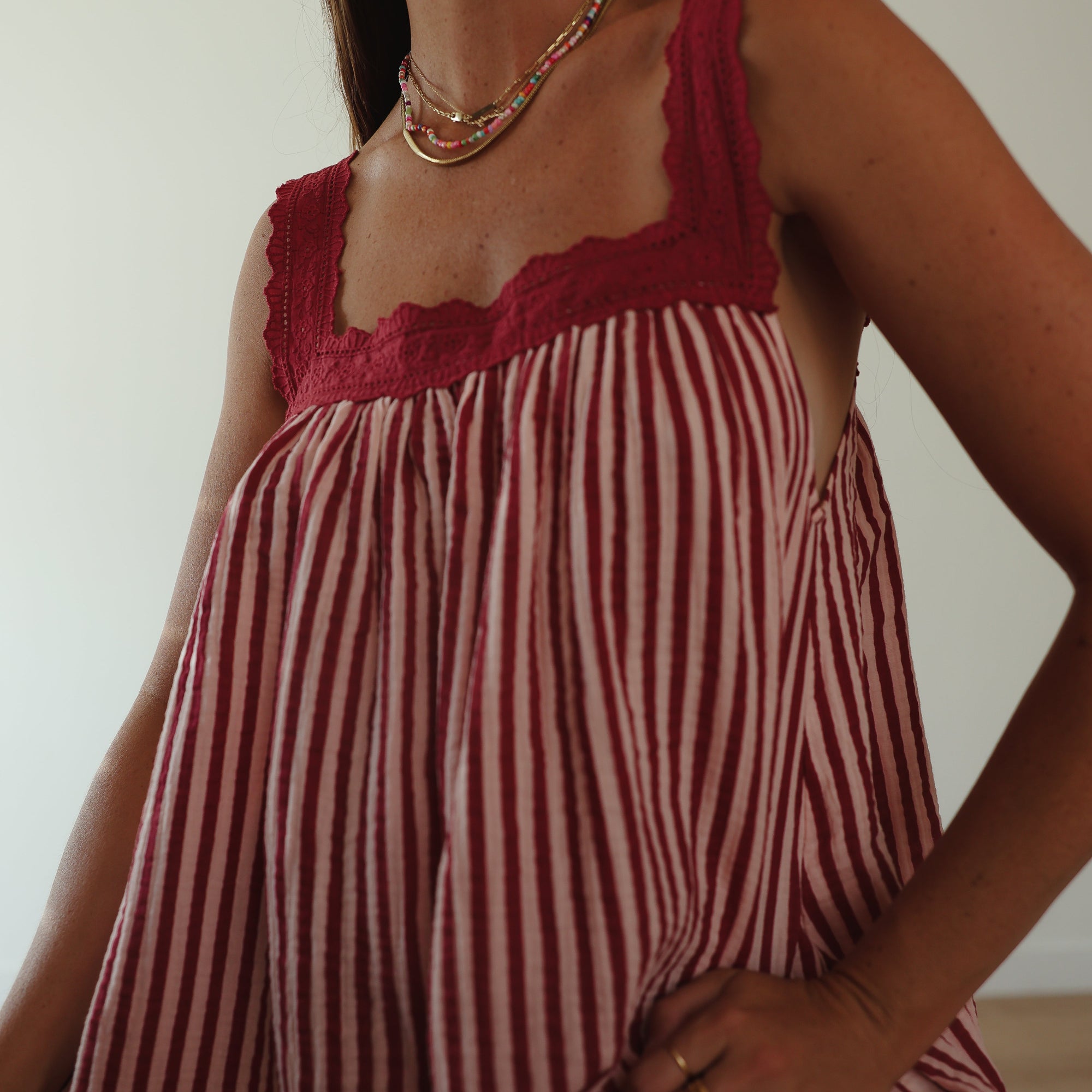 ALAKAI JUNO LACE NECK MINI DRESS: WINE & PINK STRIPE