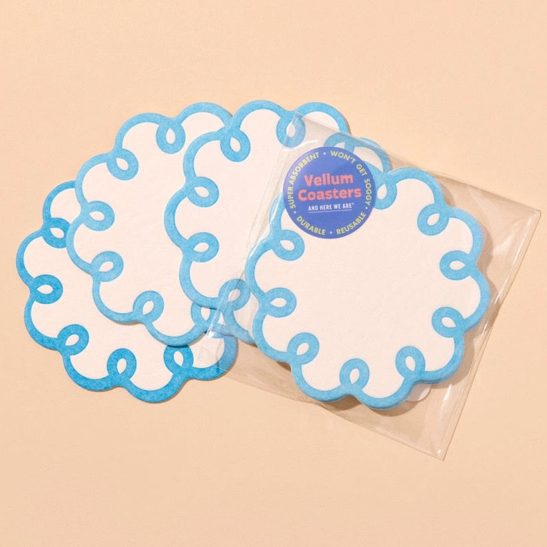 AND HERE WE ARE COQUETTE SCALLOPED VELLUM COASTERS 4PC: CORNFLOWER BLUE