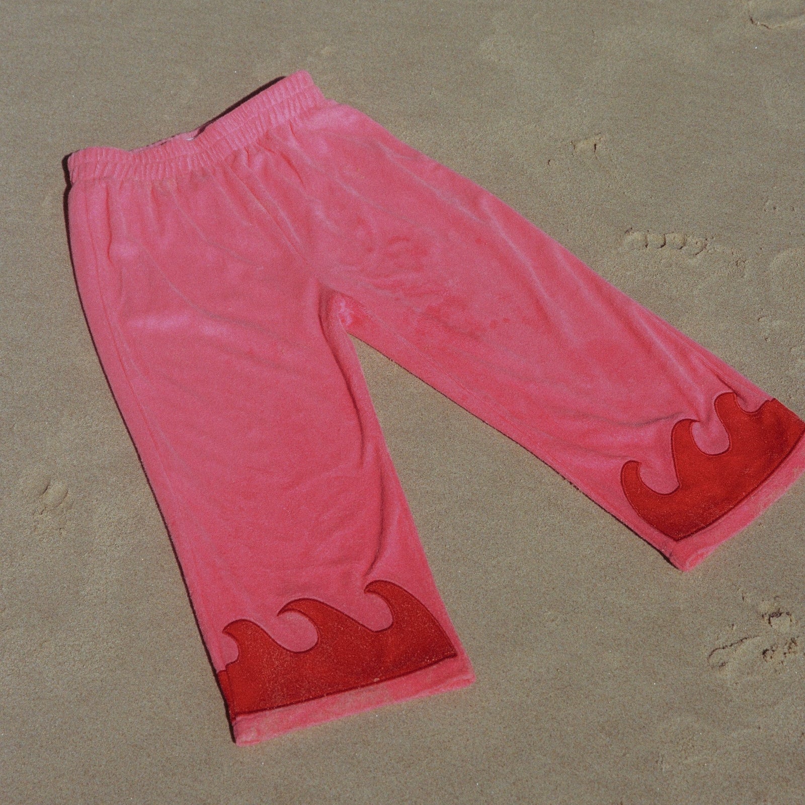 SPICY DUGONG KIDS WAVE TERRY PANTS: CORAL CRUSH