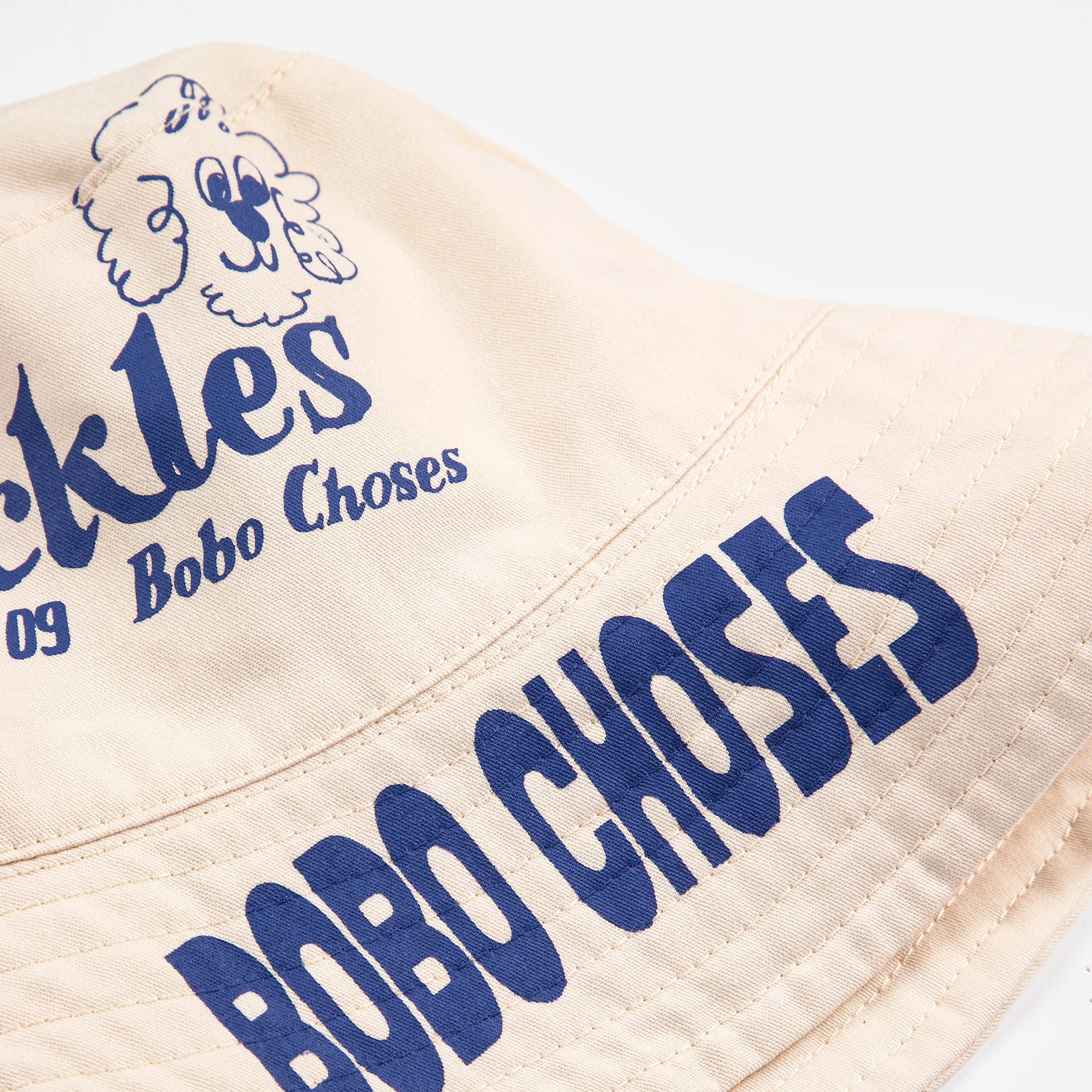 BOBO CHOSES PICKLES REVERSIBLE HAT: OFFWHITE