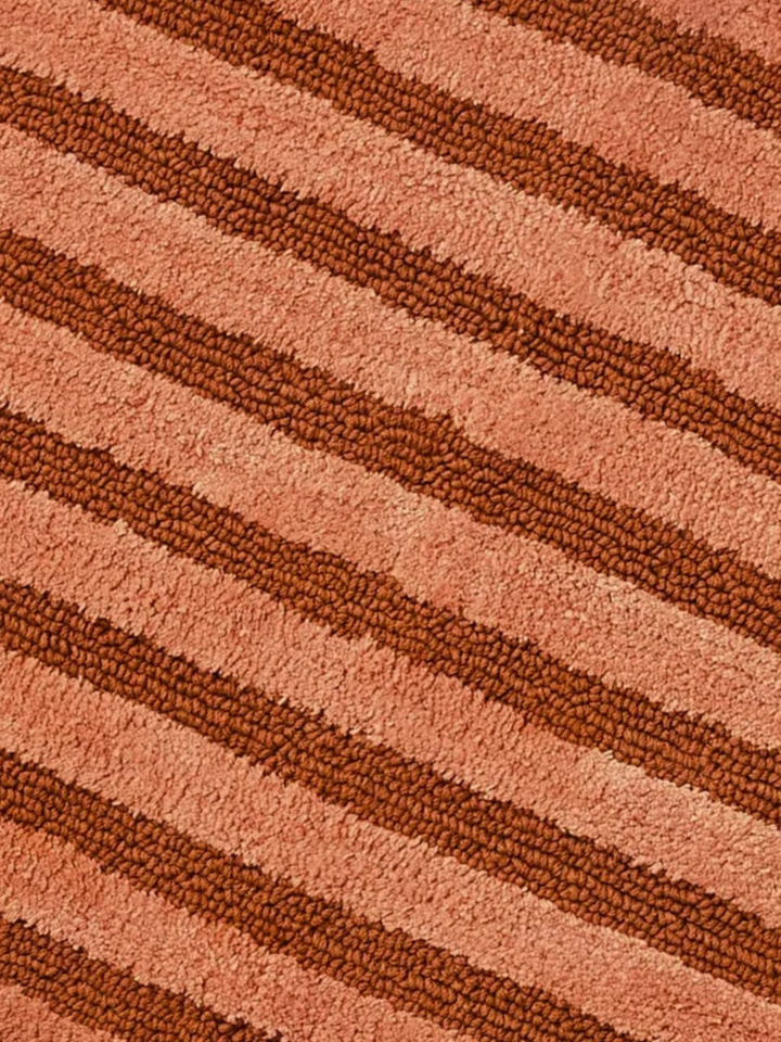 Bonnie and Neil stripe reversible bath mat in terracotta, detail