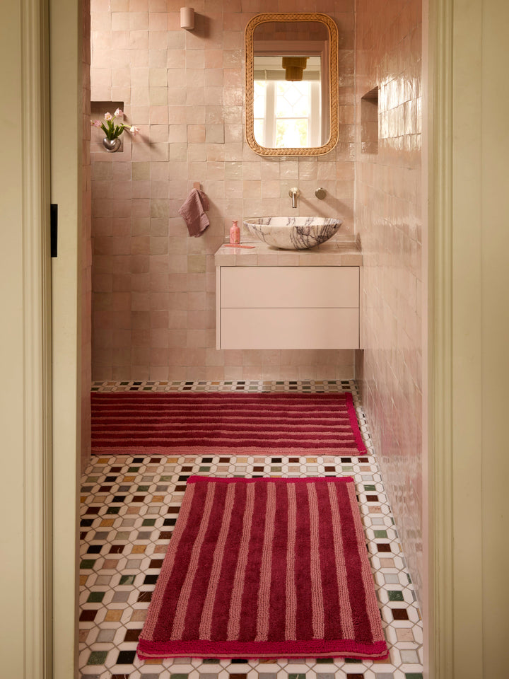 Bonnie and Neil stripe reversible bath mat in burgundy