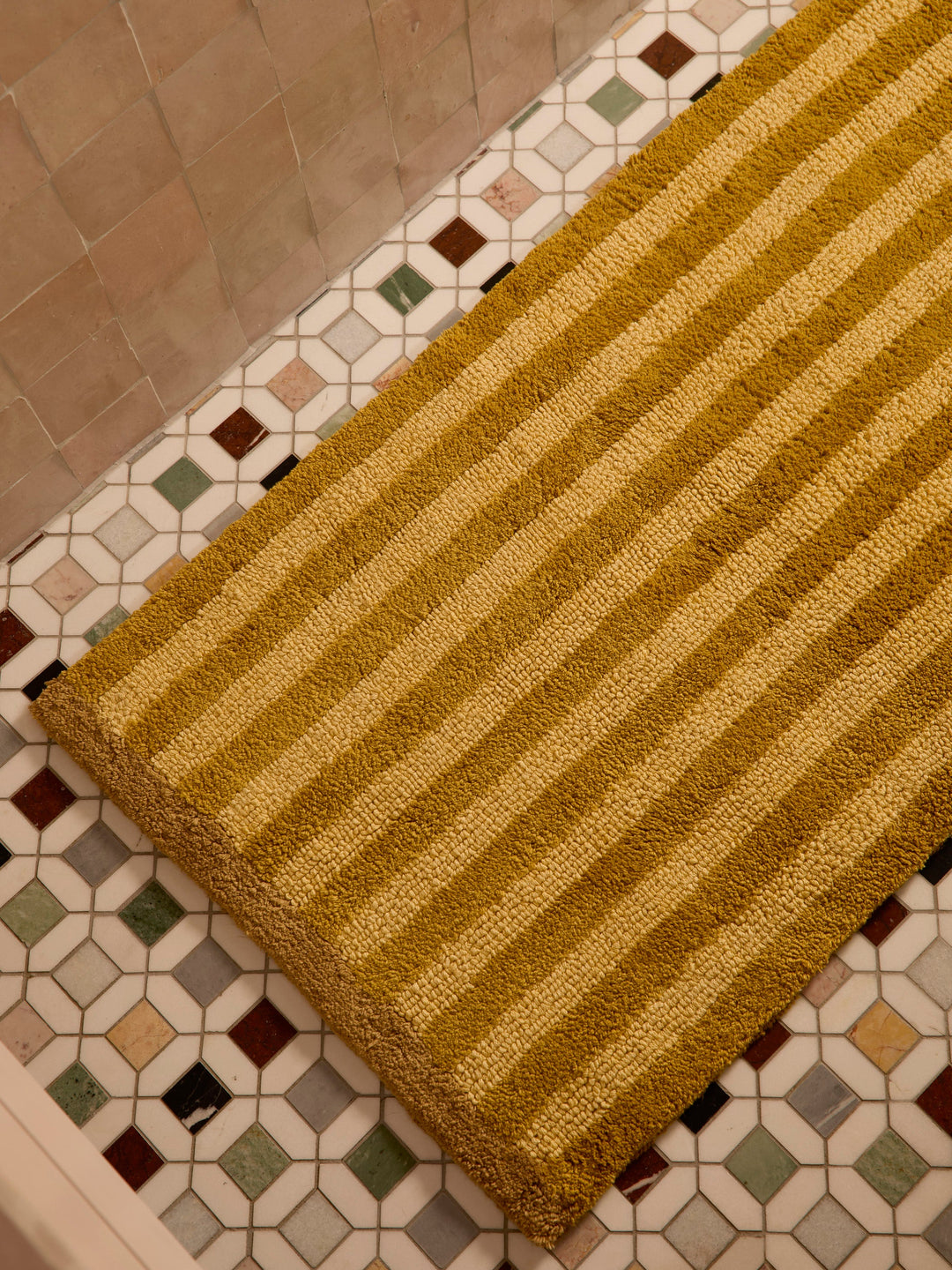 Bonnie and Neil stripe reversible long bath mat in mustard, flat