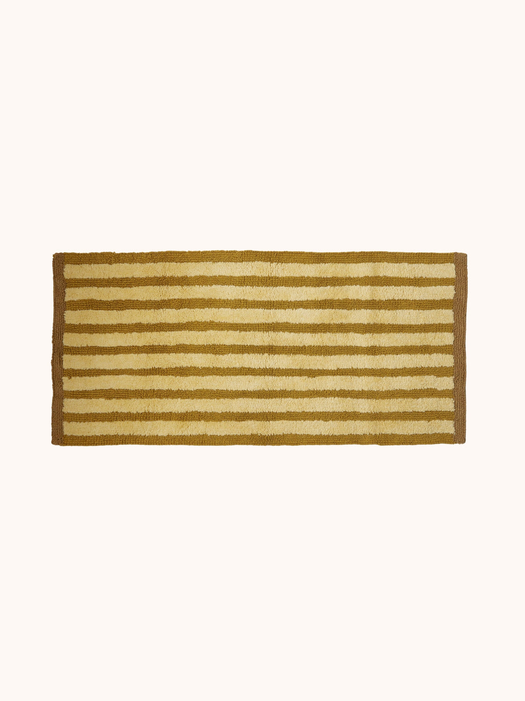 Bonnie and Neil stripe reversible long bath mat in mustard, styled