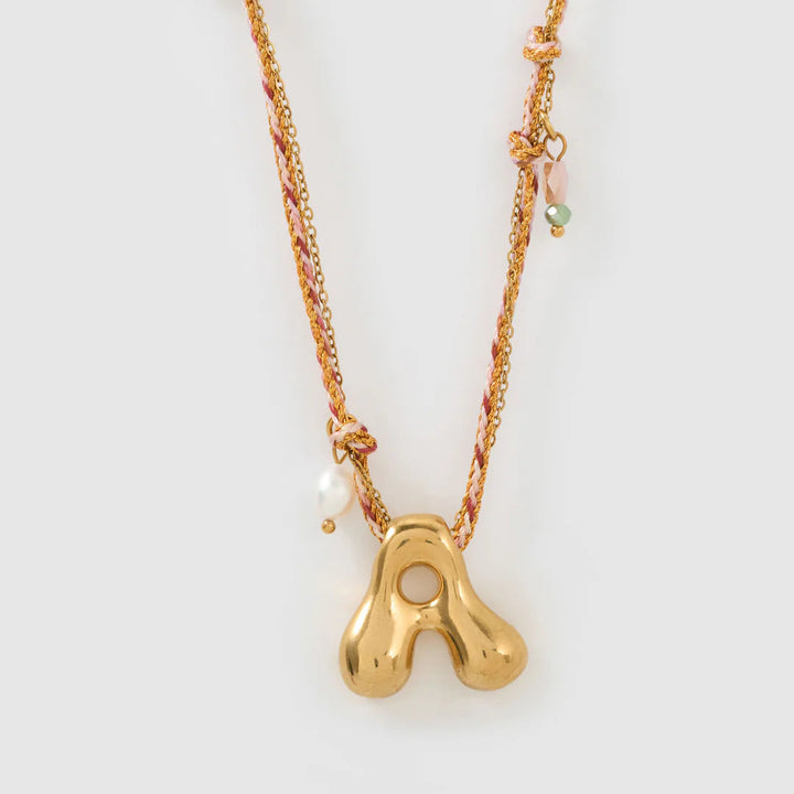 ARMS OF EVE BUBBLE LETTER NECKLACE: BLUSH