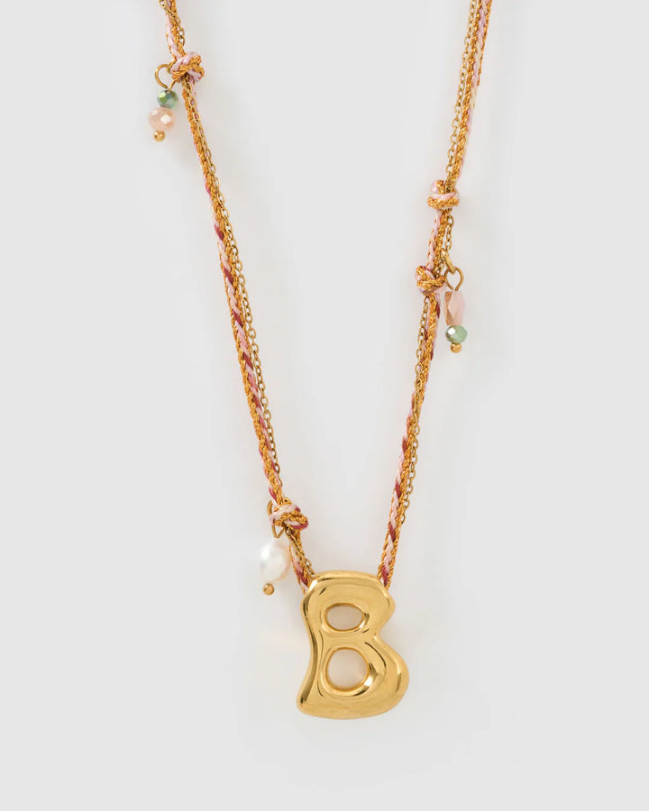 ARMS OF EVE BUBBLE LETTER NECKLACE: BLUSH