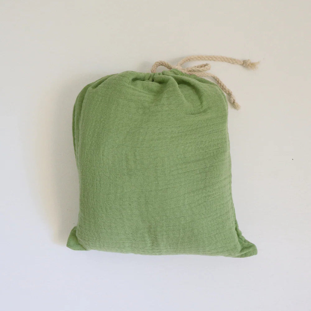 WORN CURATIONS BABY MUSLIN COT SHEET: APPLE