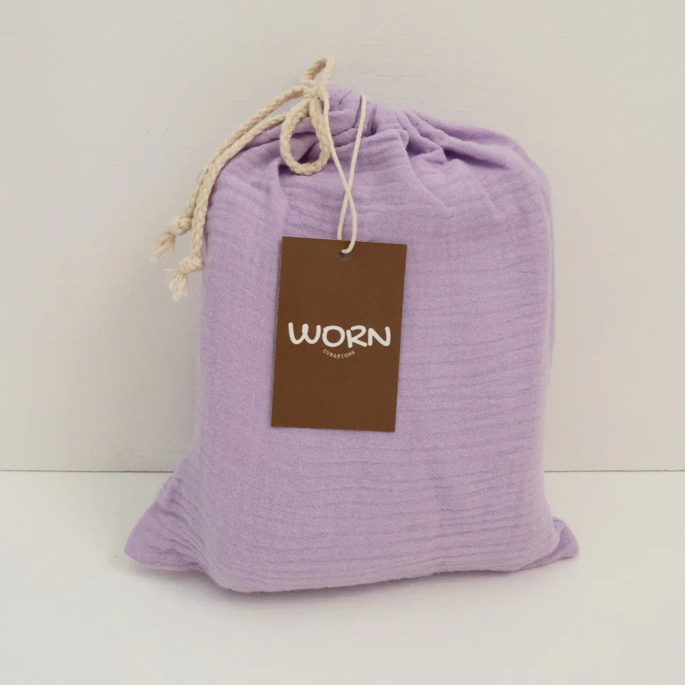 WORN CURATIONS BABY MUSLIN COT SHEET: LAVENDER