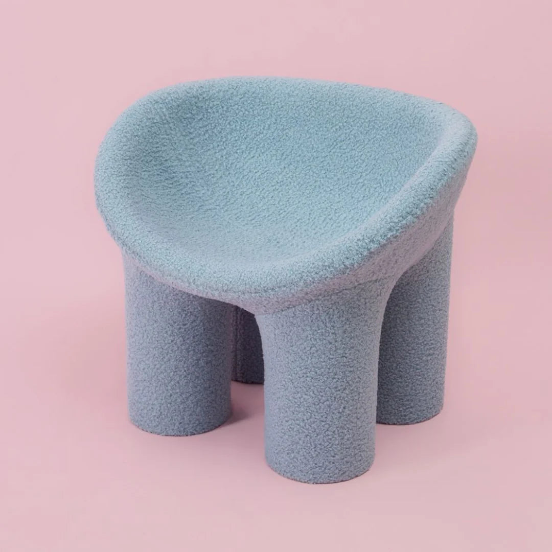 COWRIE & CONCH REPLICA ROLY CHAIR: BOUCLE