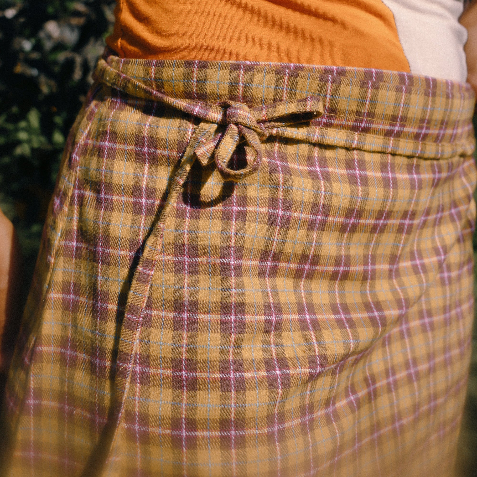ATMOSEA MINI WRAP SKIRT: FLANNEL PLAID
