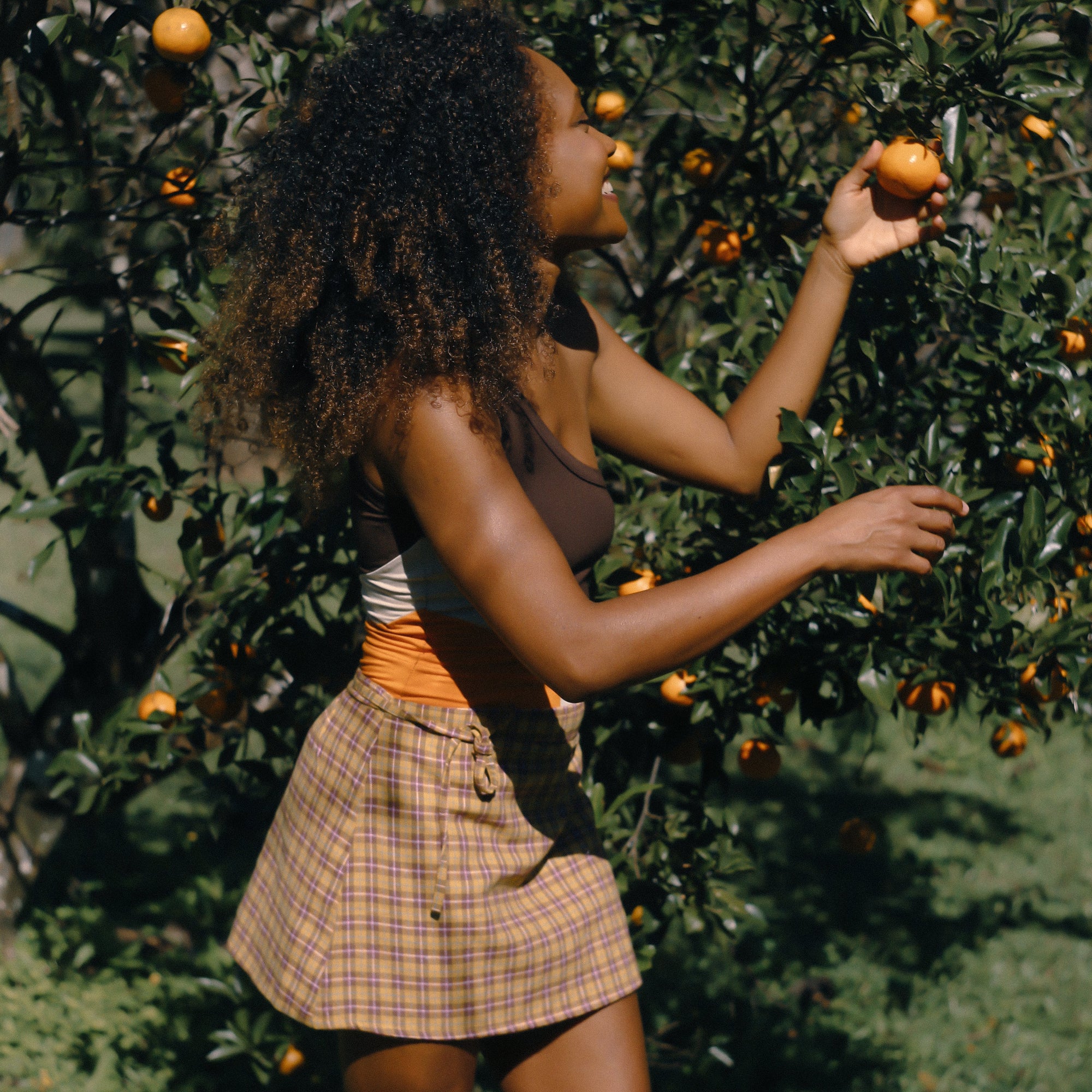 ATMOSEA MINI WRAP SKIRT: FLANNEL PLAID