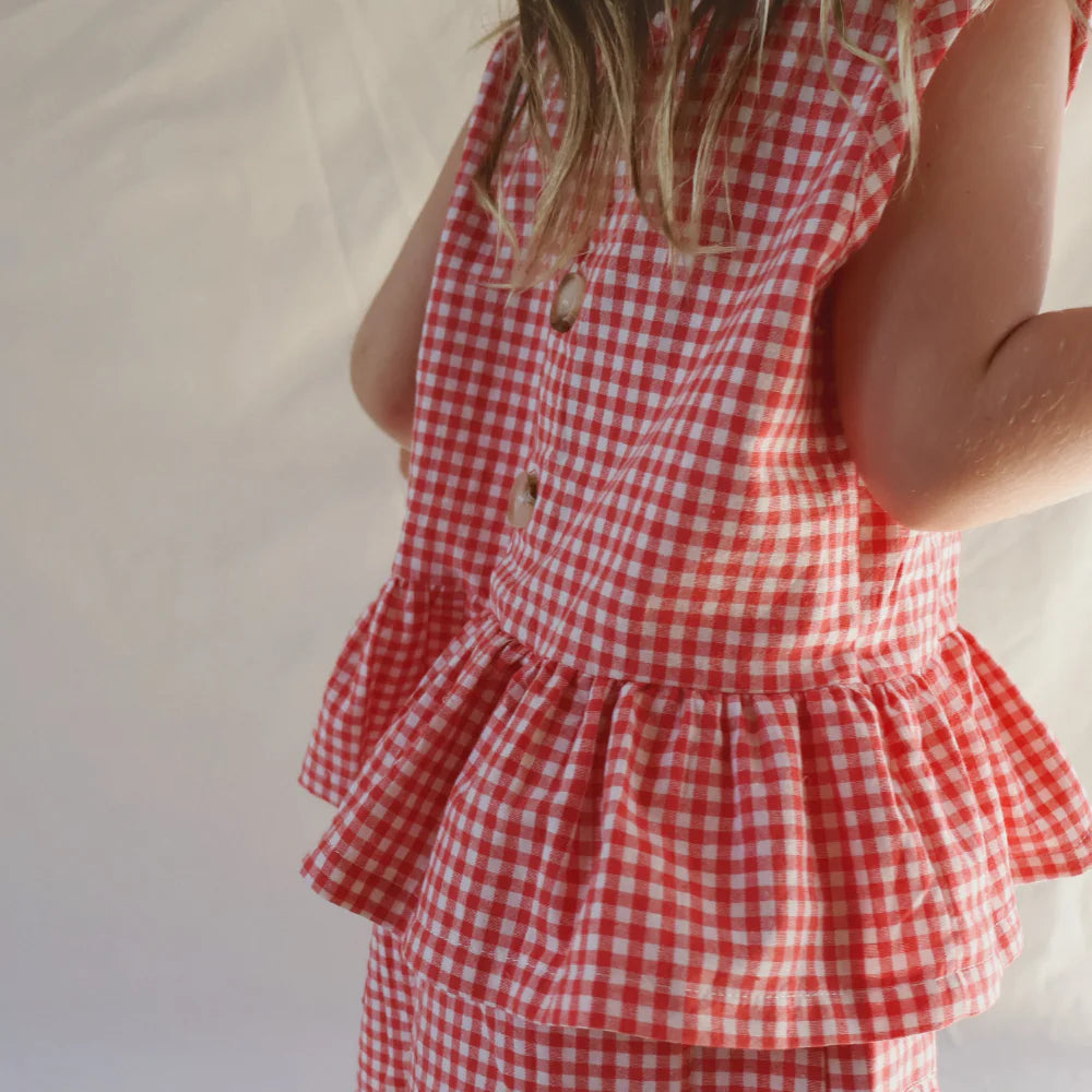 WORN CURATIONS CHECKY SWING TOP: CHILLI