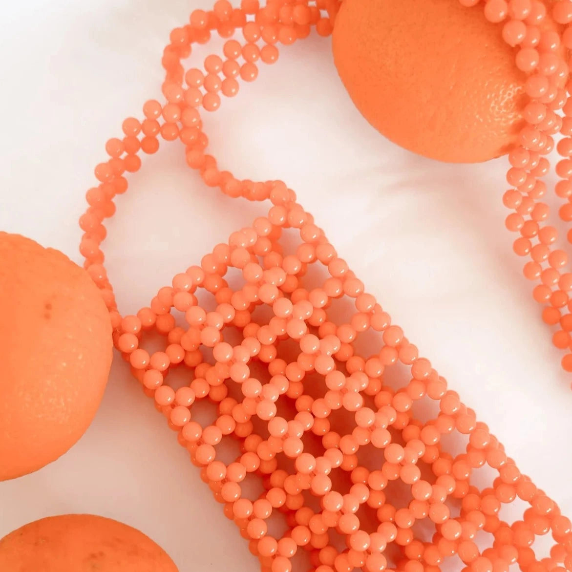 HIBISCUS THE LABEL BEADED PHONE BAG: ORANGE SODA POP