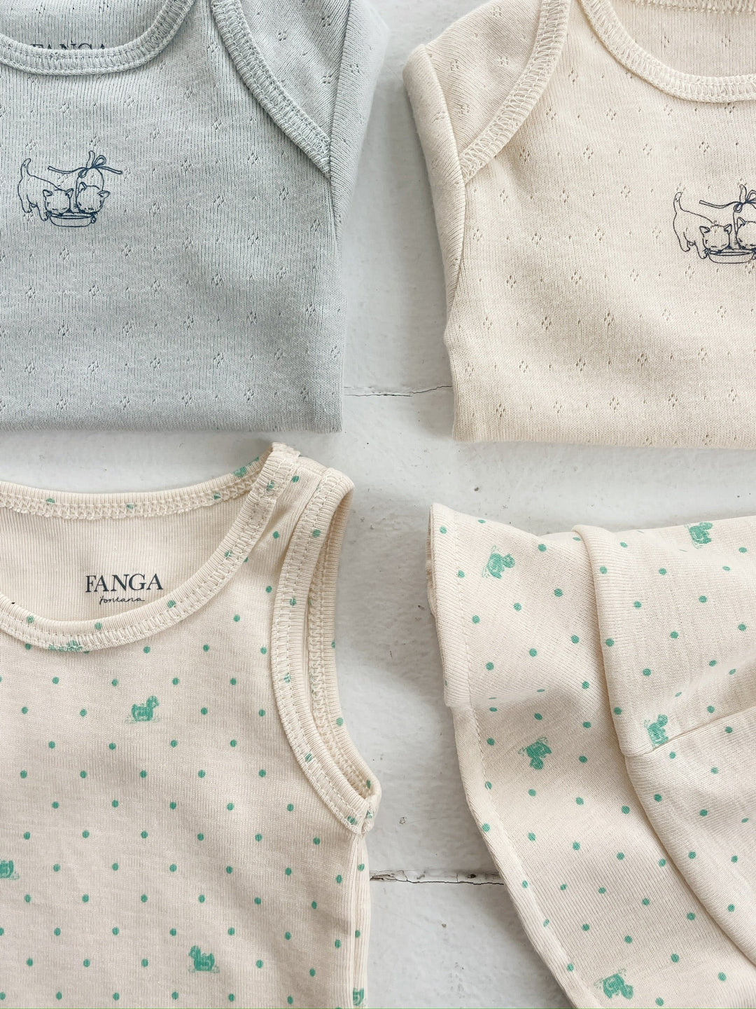 Konges Sløjd Perla LS Bodysuit 2pc buttercream/pearl blue flat lay