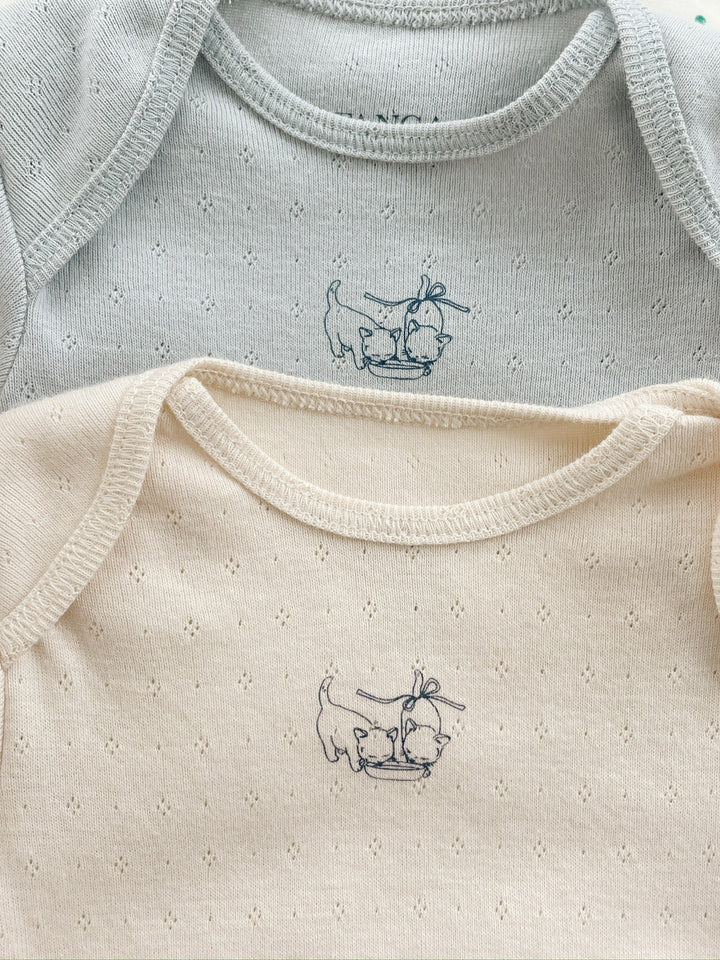 Konges Sløjd Perla LS Bodysuit 2pc buttercream/pearl blue flat lay
