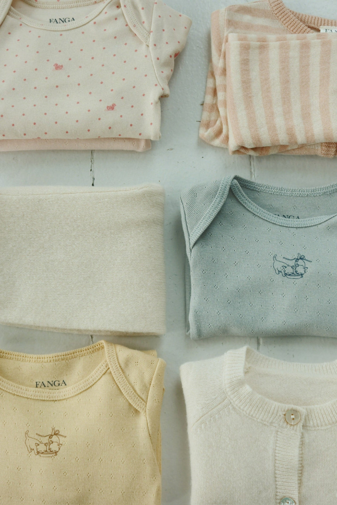 Konges Sløjd Perla LS Bodysuit 2pc buttercream/pearl blue flat lay