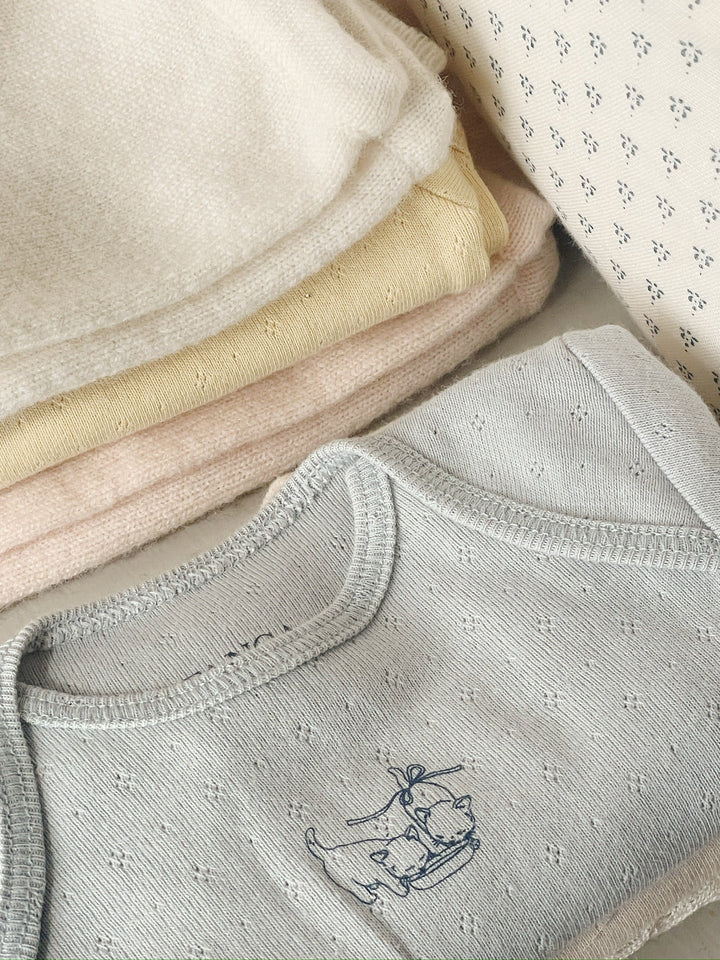 Konges Sløjd Perla LS Bodysuit 2pc buttercream/pearl blue flat lay