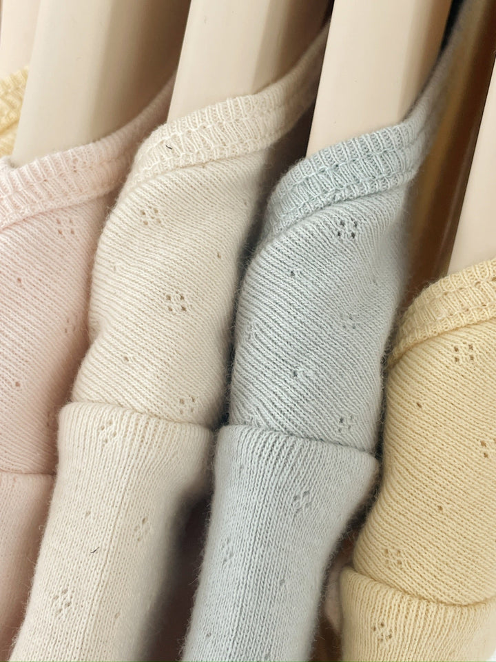 Konges Sløjd Perla LS Bodysuit 2pc buttercream/pearl blue flat lay