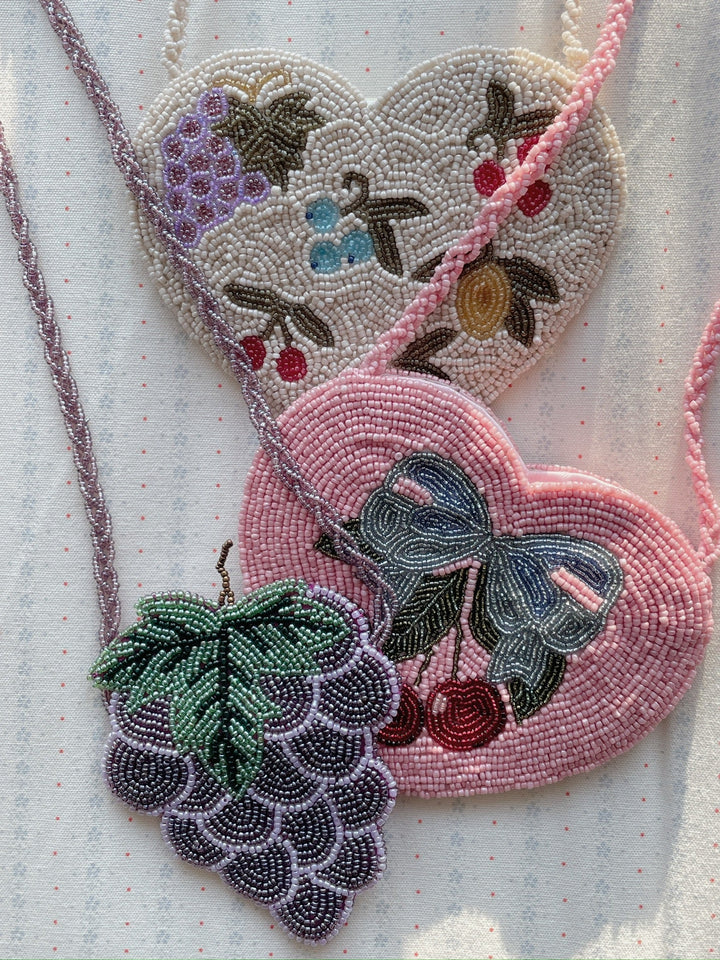 Konges Sløjd Beaded Heart Bag Amarena flat lay