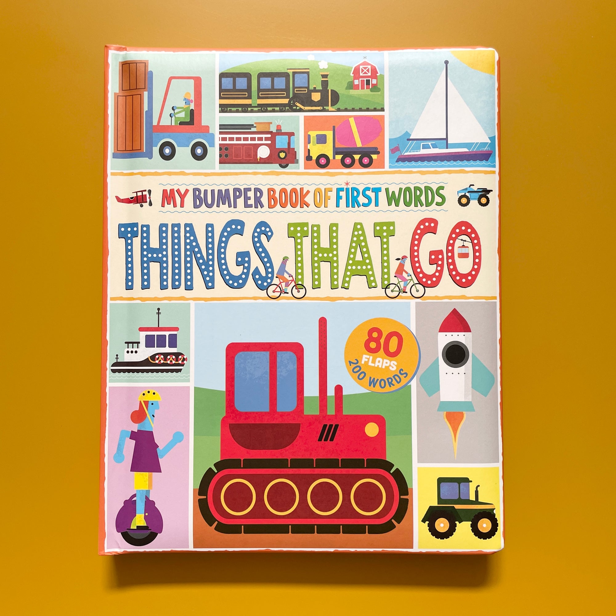 MY BUMPER BOOK OF FIRST WORDS: THINGS THAT GO