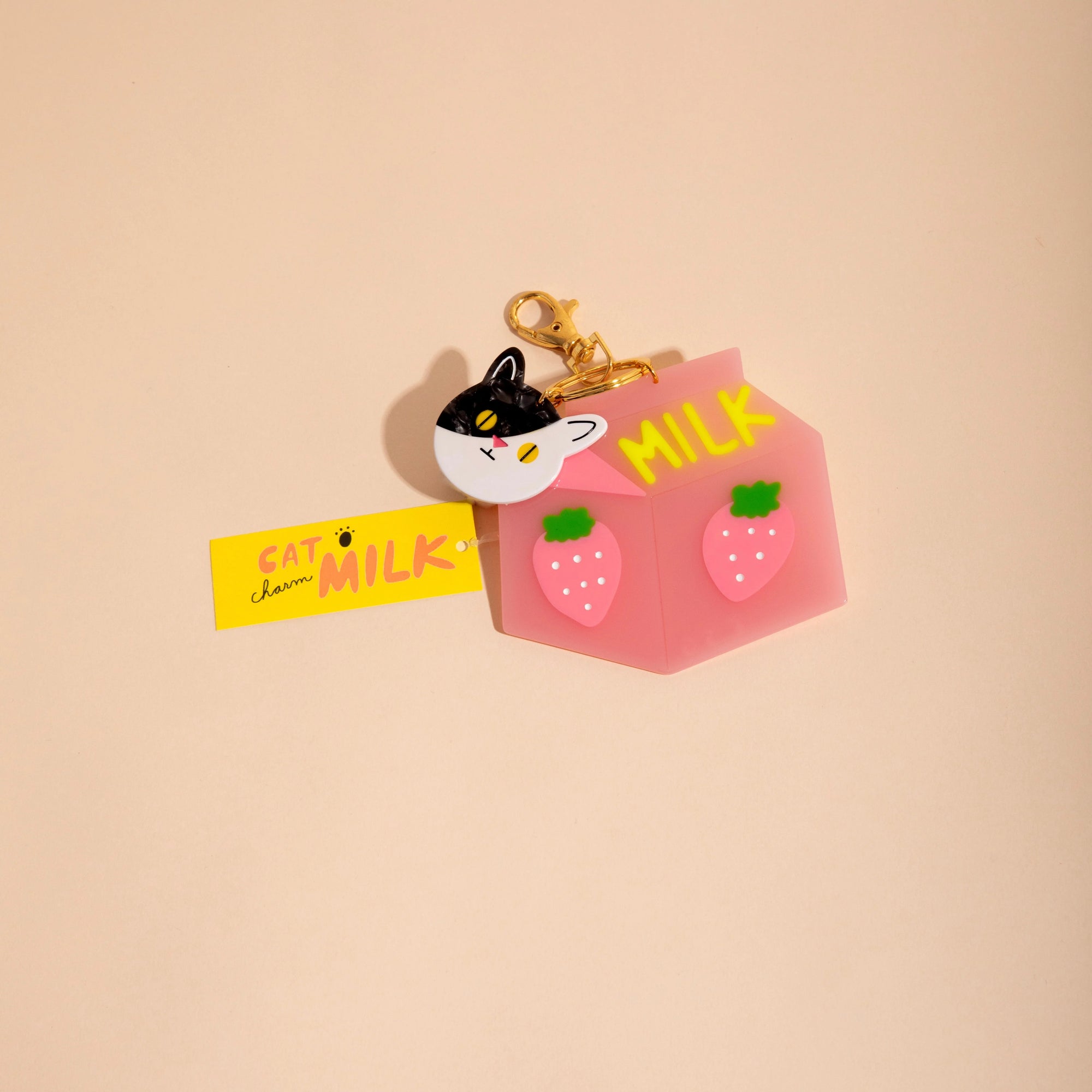 CAROLYN SUZUKI STUDIO CAT MILK CHARM KEYCHAIN