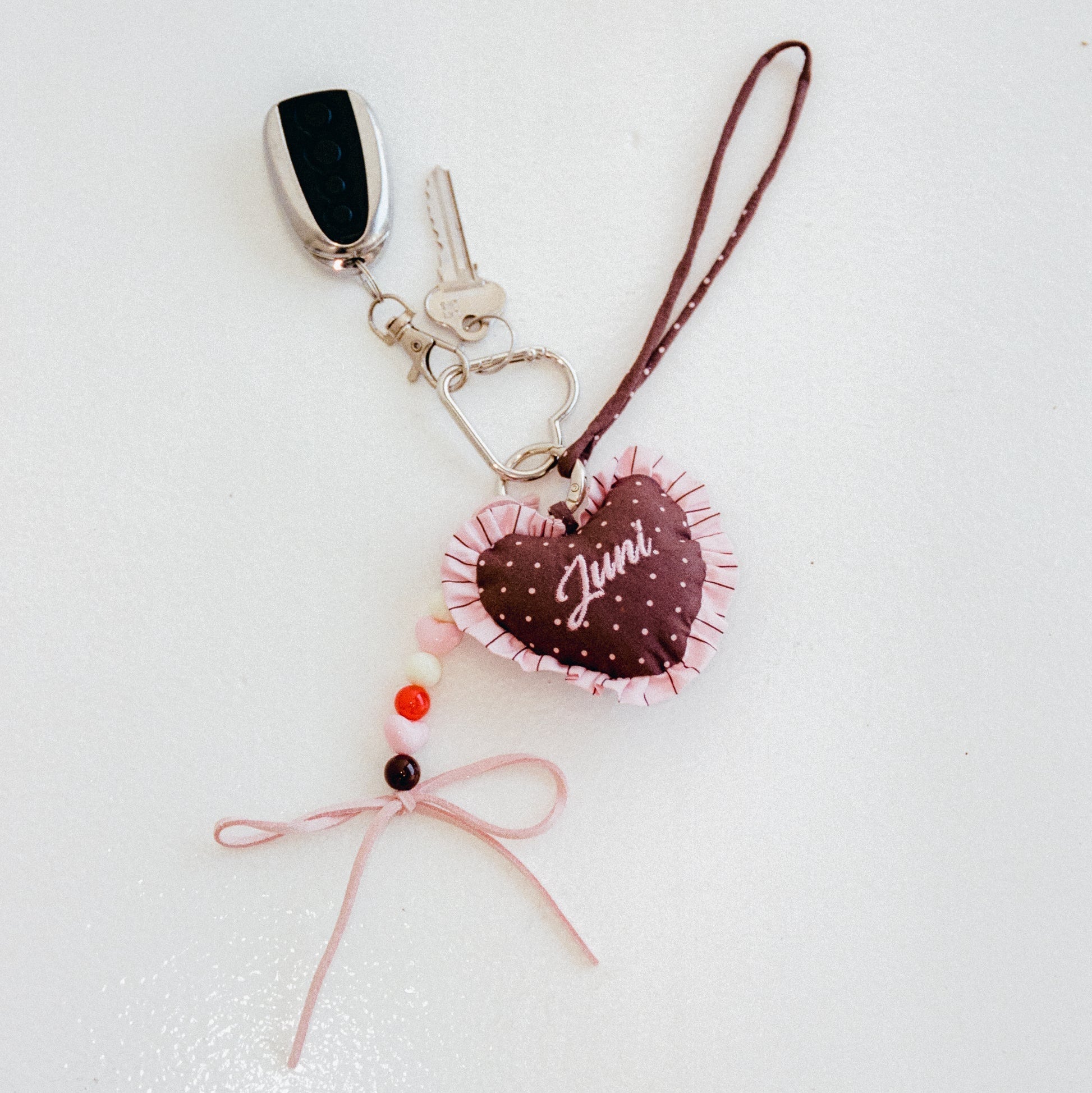 JUNI HEART BAG CHARM: COCOA SPOT