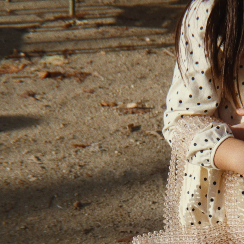 Cherry Perla Hand Bag held - lifestyle detail