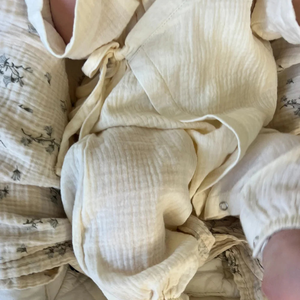 WORN CURATIONS MUSLIN KIMONO ROMPER: MILK