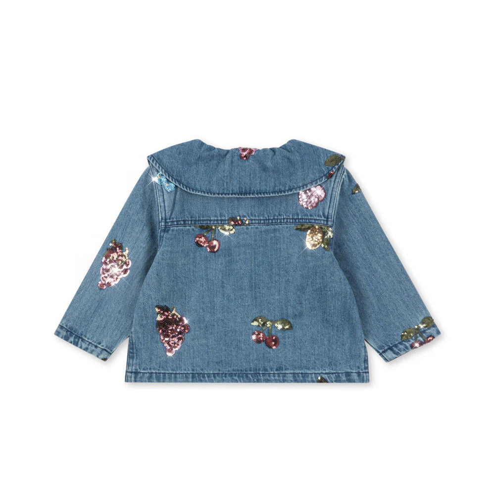 Blue denim jacket with floral embellishments on a white background