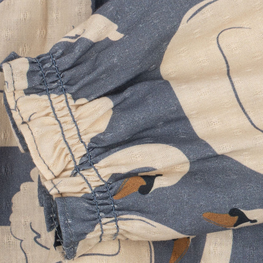 Konges Sløjd Evia Romper GOTS in Swan - leg button detail