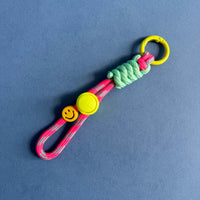 ROGER RAD FACE KEYCHAIN