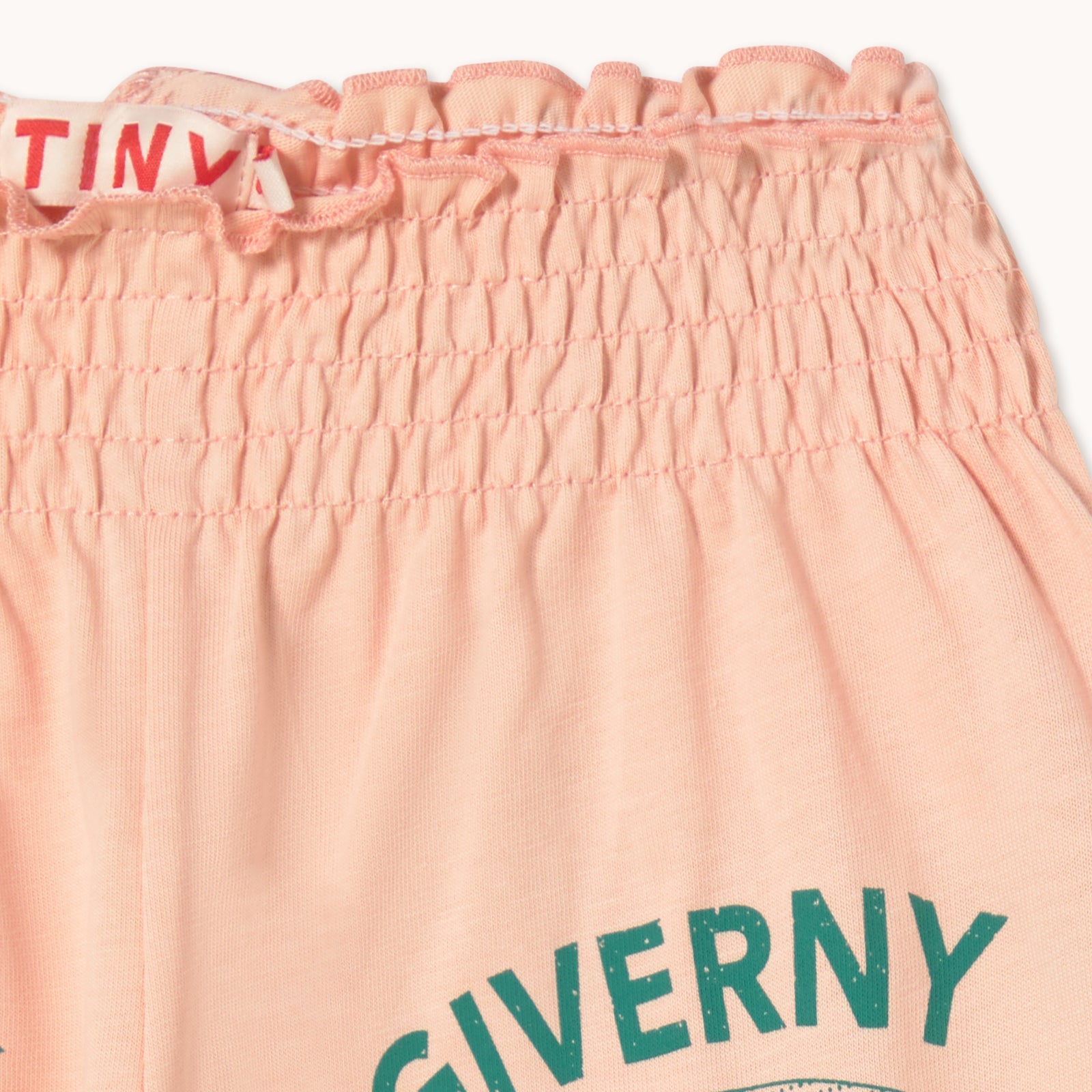 TINY COTTONS GIVERNY GRAPHIC SMOCKED SHORTS: WILD ROSE
