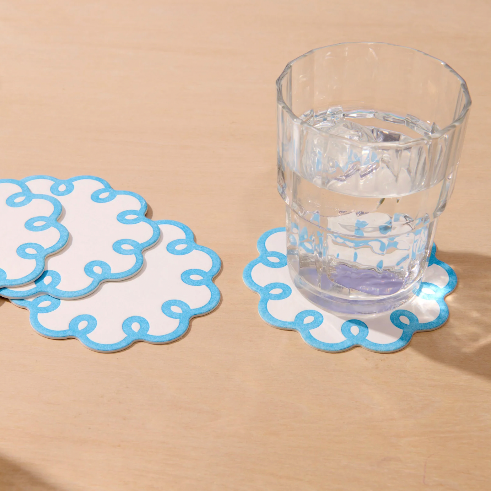 AND HERE WE ARE COQUETTE SCALLOPED VELLUM COASTERS 4PC: CORNFLOWER BLUE