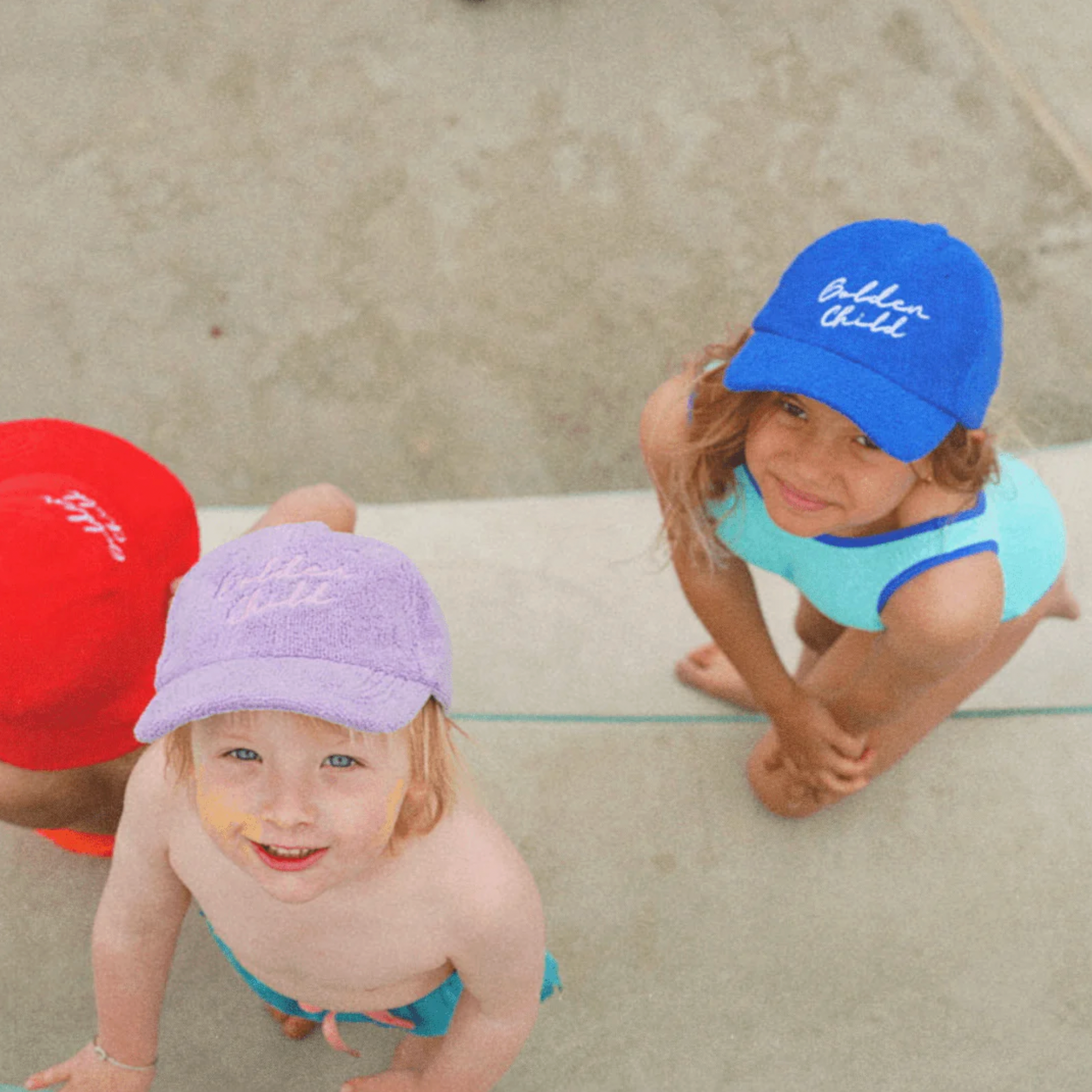 GOLDEN CHILD ENDLESS SUMMER BRIMMED TERRY HAT: RACER RED