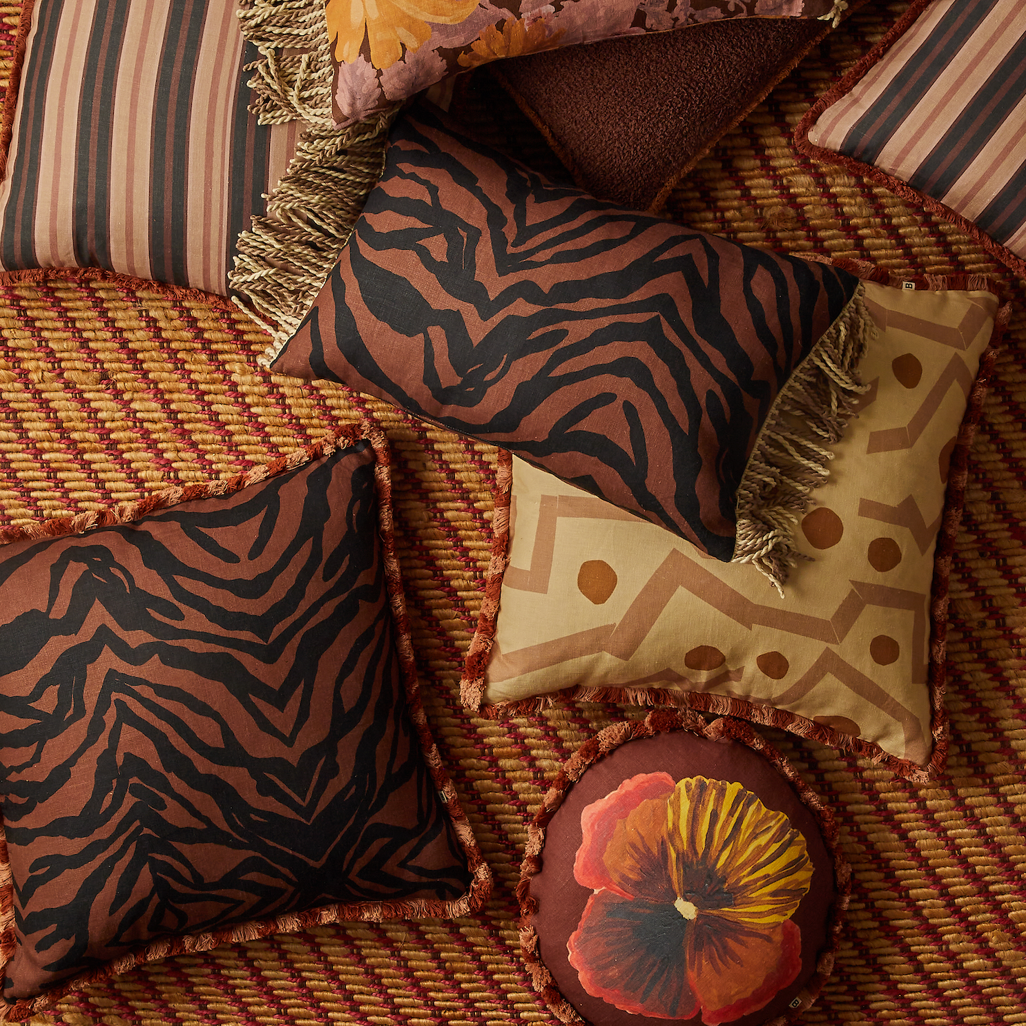 BONNIE AND NEIL WILD PANSY ROUND CUSHION: CHOCOLATE/ 45CM