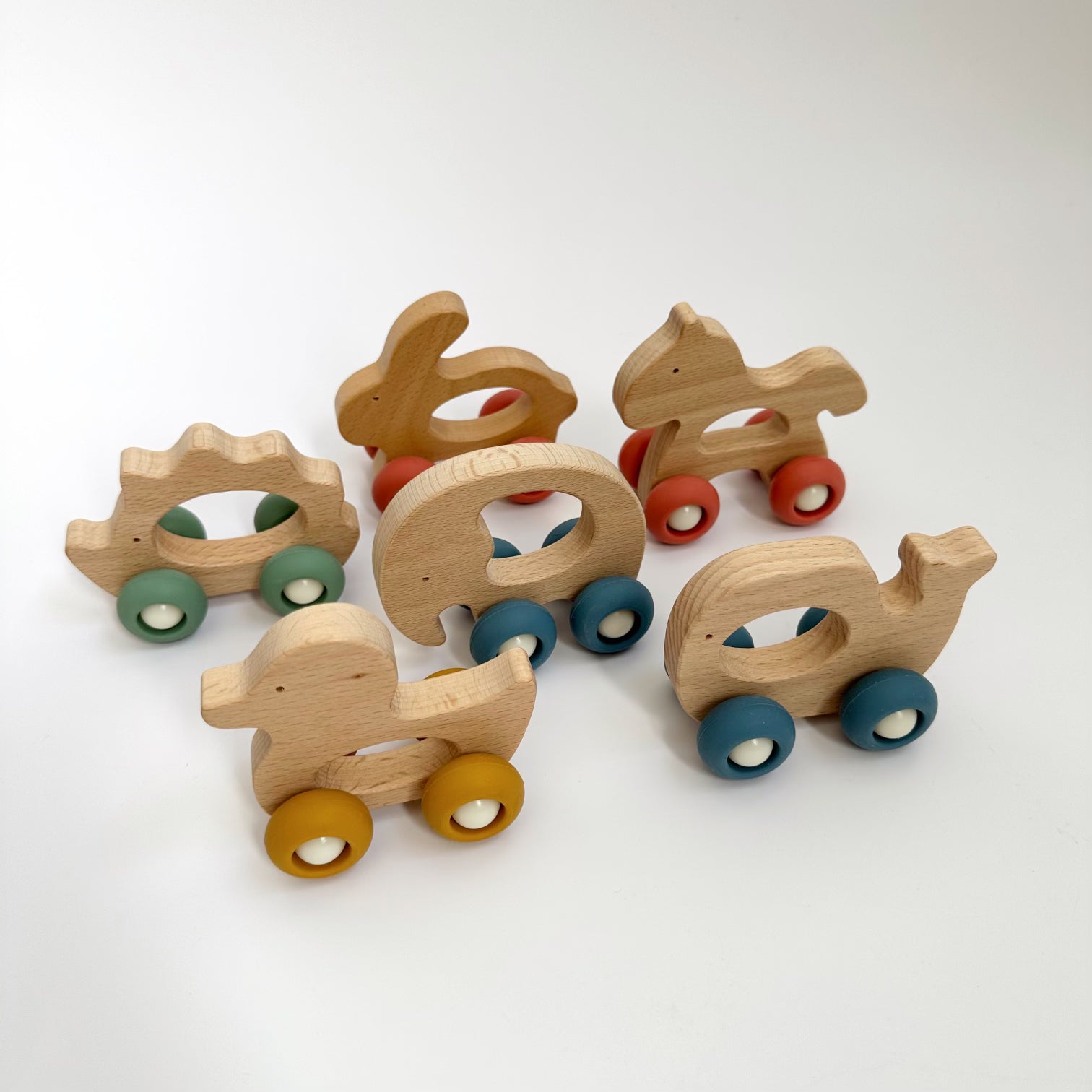 WOODEN ANIMALS WITH RUBBER WHEELS