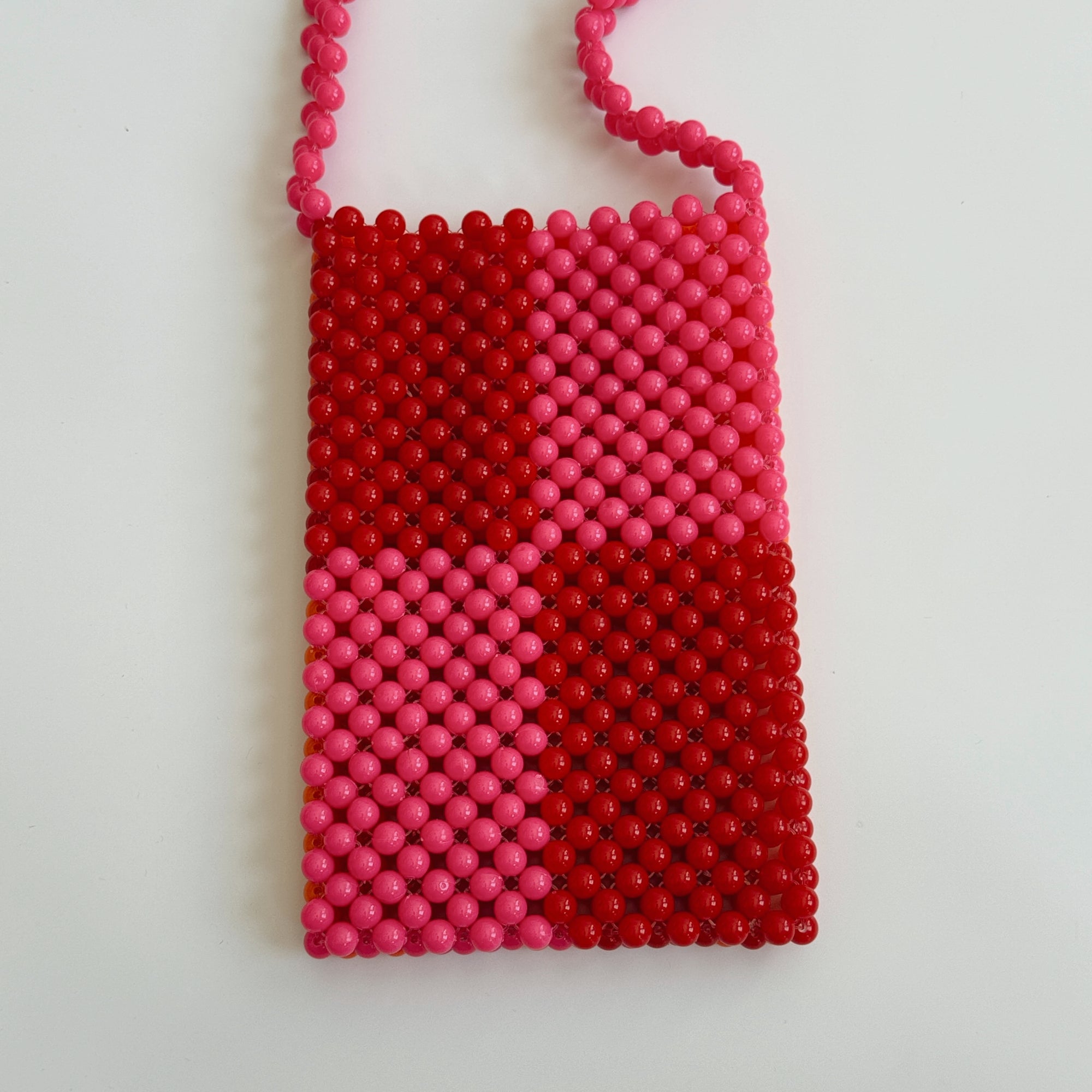 HIBISCUS THE LABEL BEADED PHONE BAG: RED/PINK