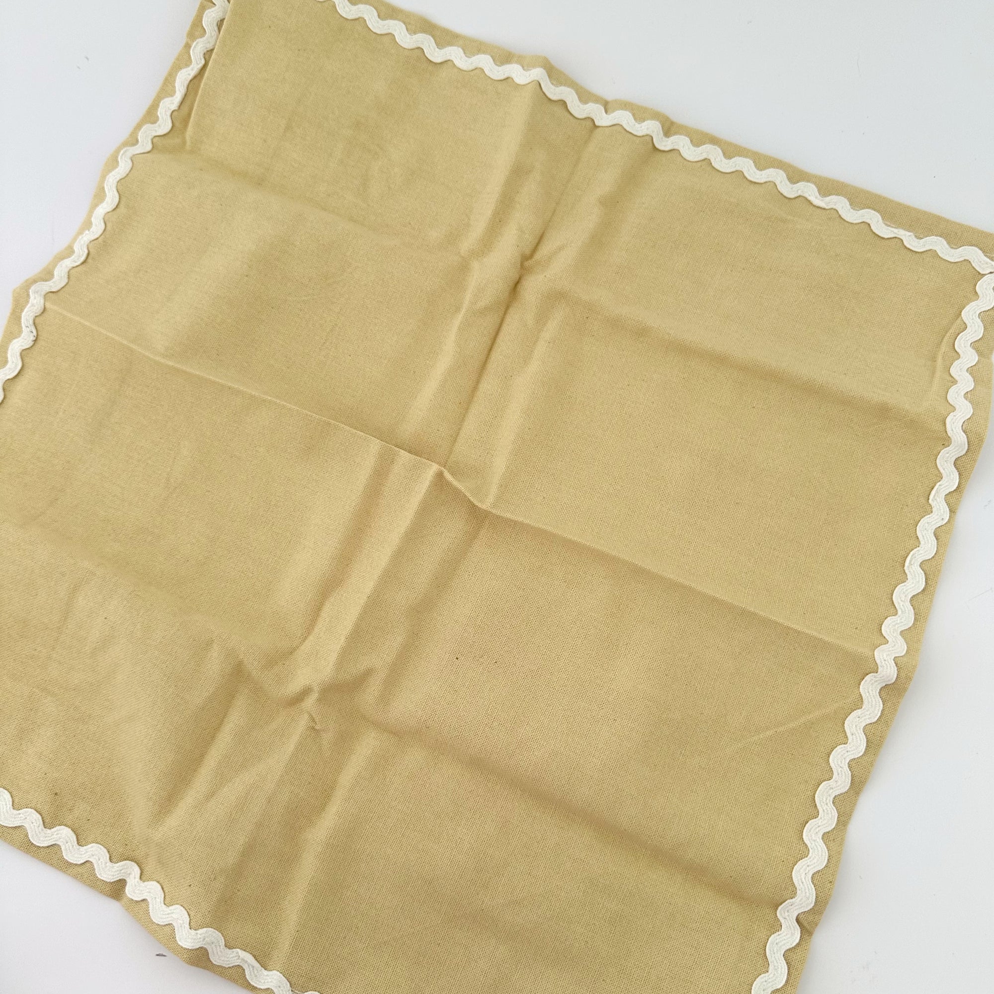 ORLA COTTON NAPKINS: BUTTER/ IVORY