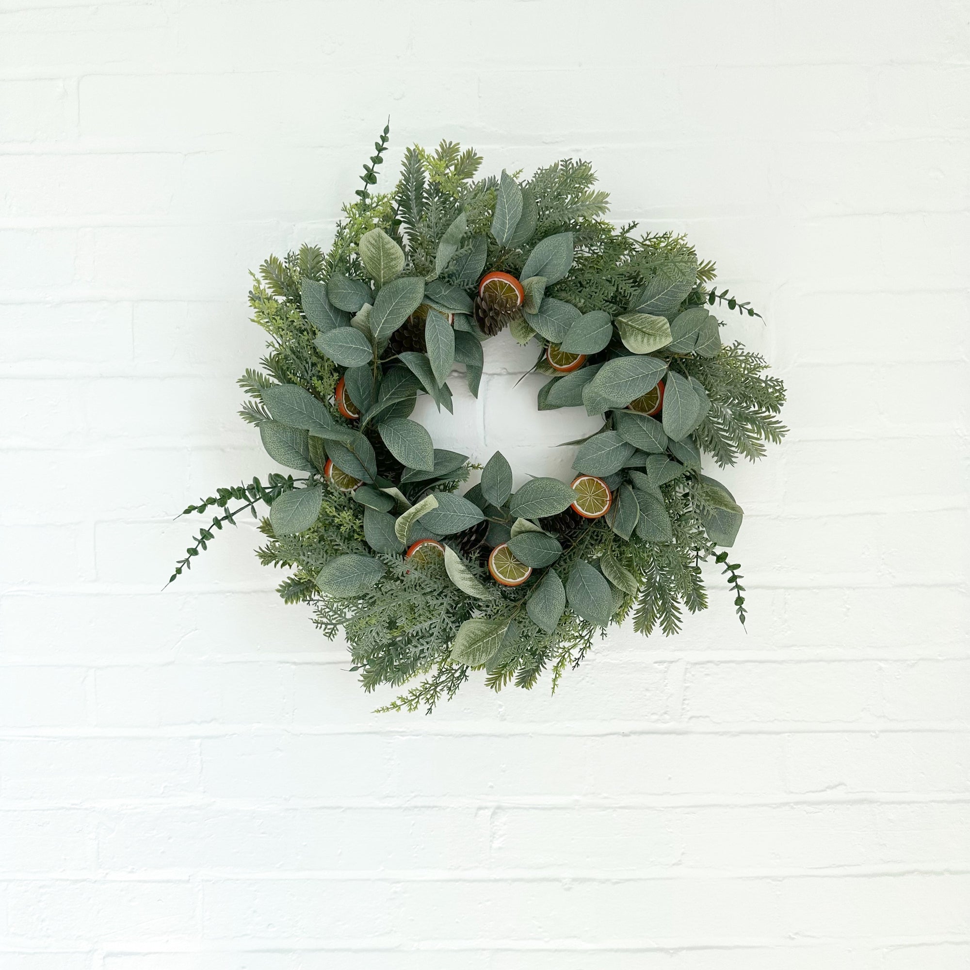 WREATH WITH ORANGE PINE CONE