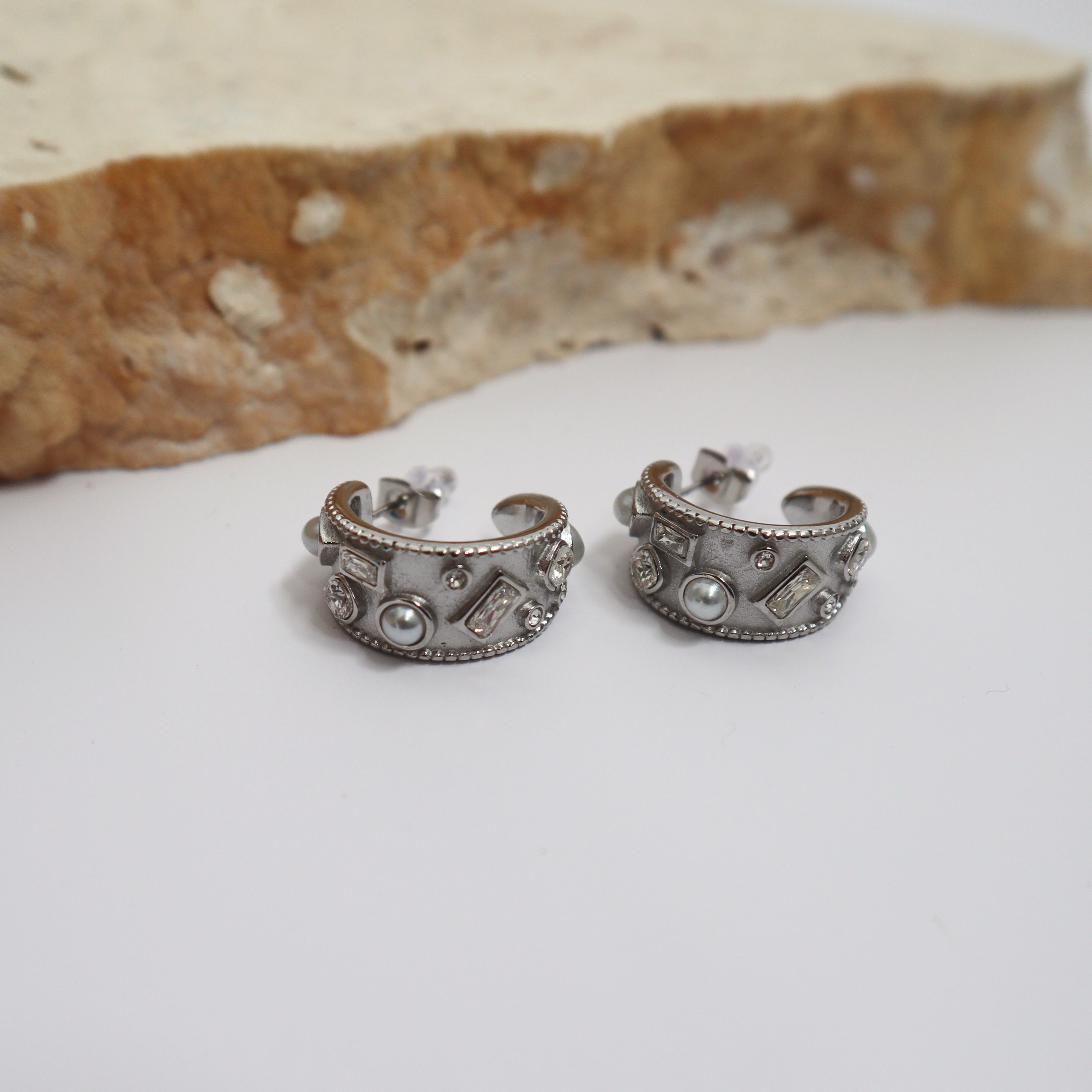 Price of silver earrings shop