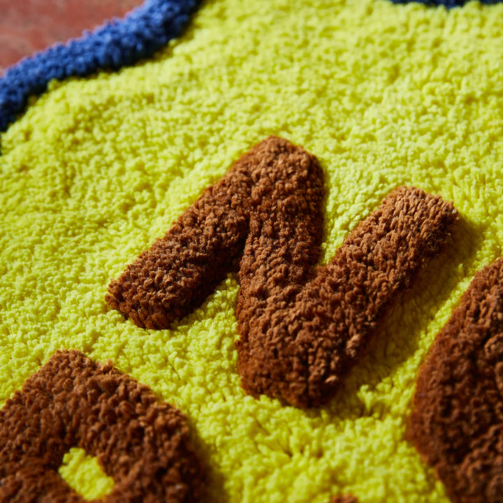 SAGE &amp; CLARE AMALIE NUDIE MINI BATH MAT: DAFFODIL
