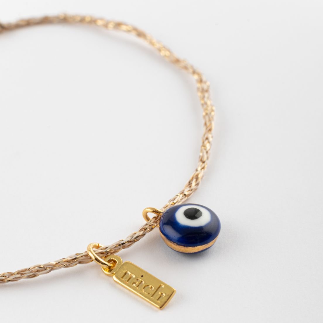 NACH BLUE EYE GOLD ROPE CHARM BRACELET