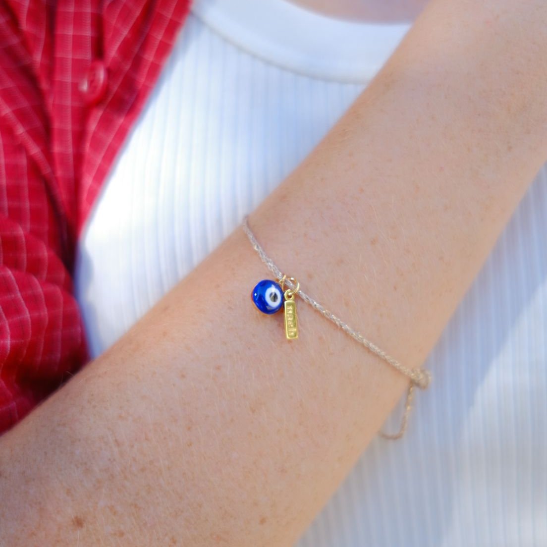 NACH BLUE EYE GOLD ROPE CHARM BRACELET