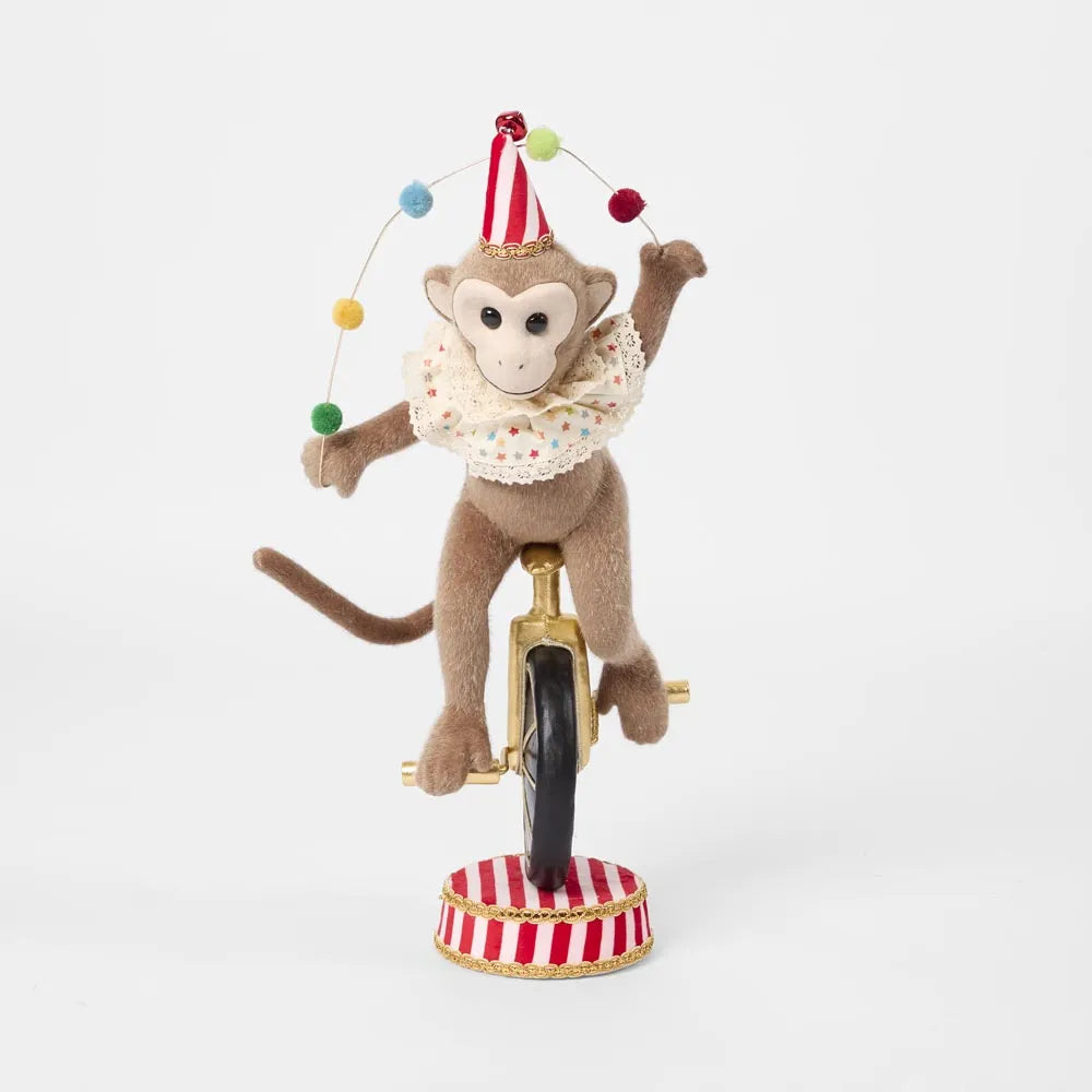 CARNIVAL MONKEY ON UNICYCLE