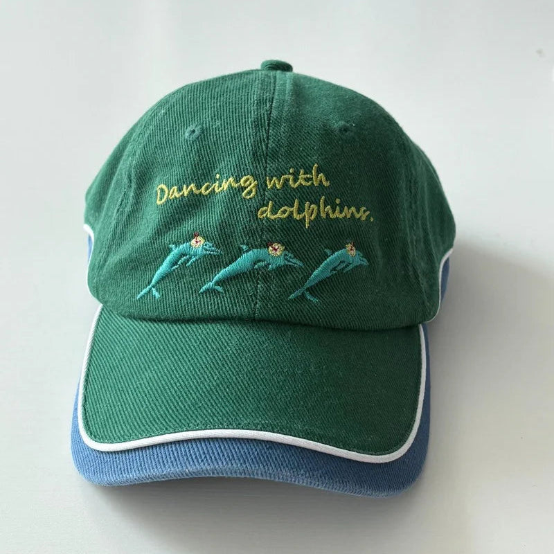 SPICY DUGONG DANCING WITH DOLPHINS CAP