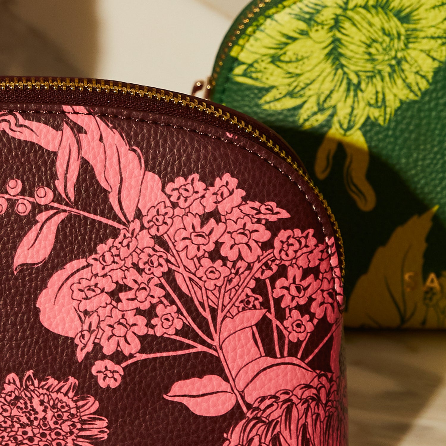 SAGE & CLARE DELPHINE COSMETIC POUCH: GARNET