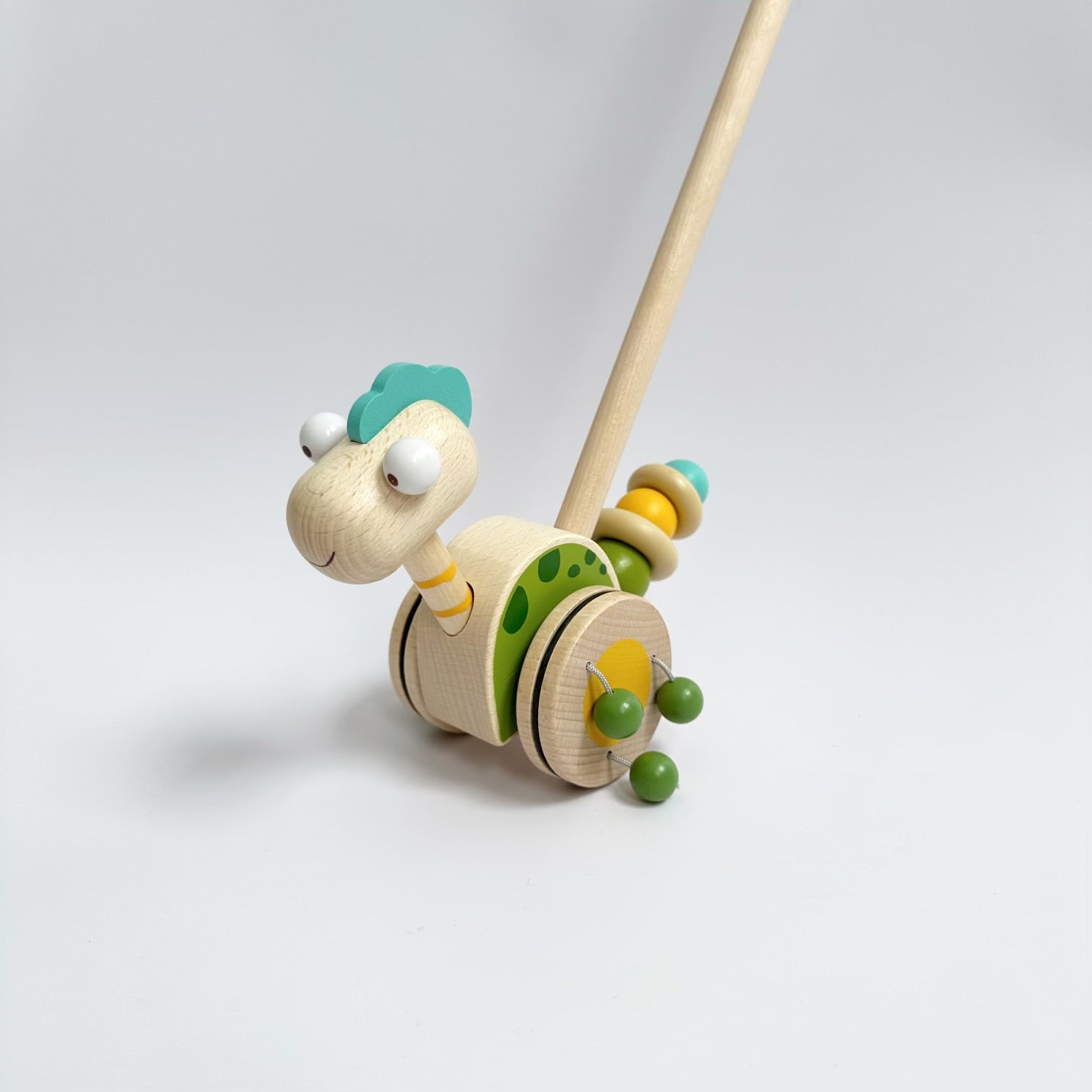 PUSH ALONG WOODEN DINO – Common Circus